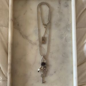 UNOde50 UNO de 50 key and pearl chain on snowflake chain